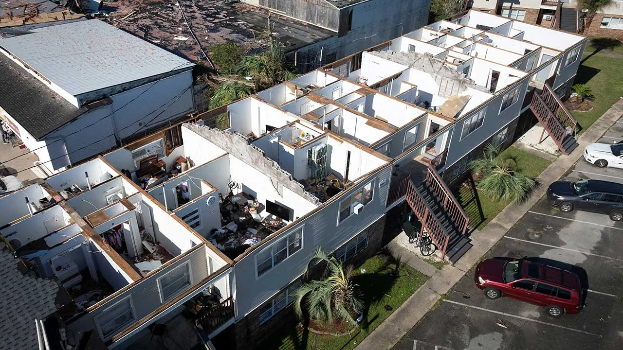 A drone view shows a damaged apartments building in the aftermath of Hurricane Isaias in Milton, Florida, US, October 11, 2026. REUTERS/Marco Bello
