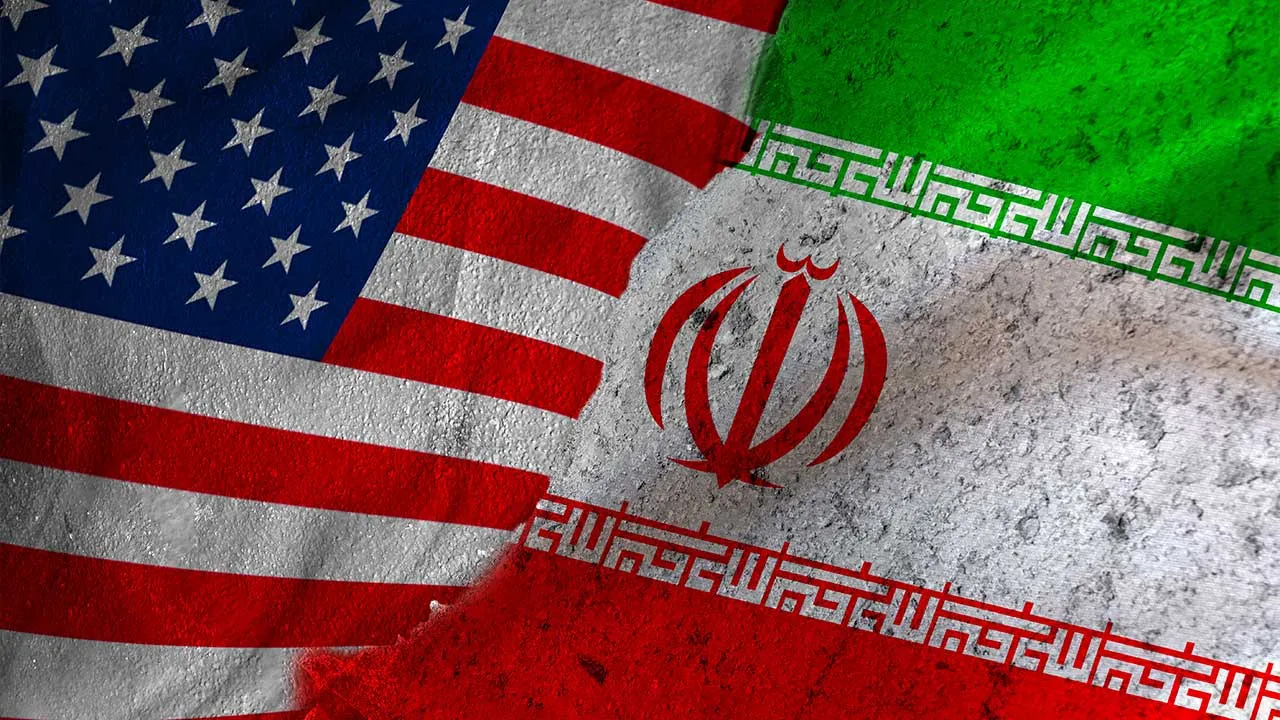 Geopolitical Tension Between United States and Iran. Iranian and American flags on a broken wall