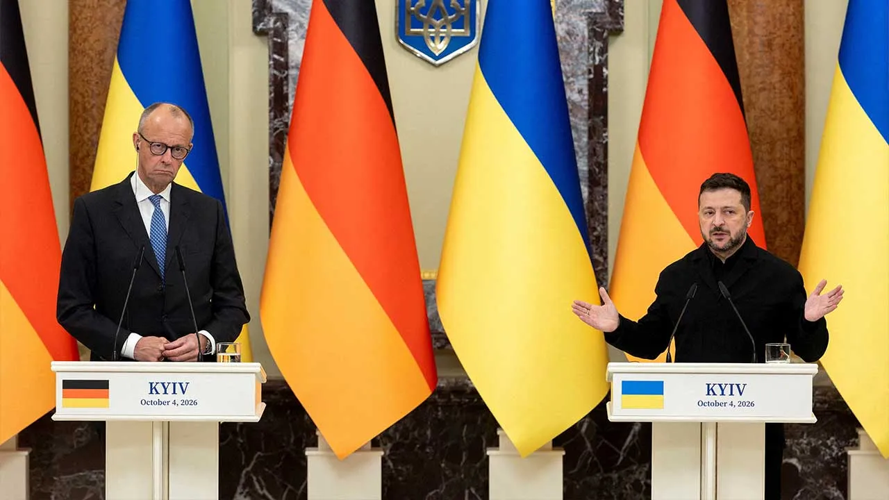 Ukraine's President Volodymyr Zelenskiy and German Chancellor Friedrich Merz attend a press conference, amid Russia's attack on Ukraine, in Kyiv, Ukraine, October 4, 2026. REUTERS/Thomas Peter TPX IMAGES OF THE DAY