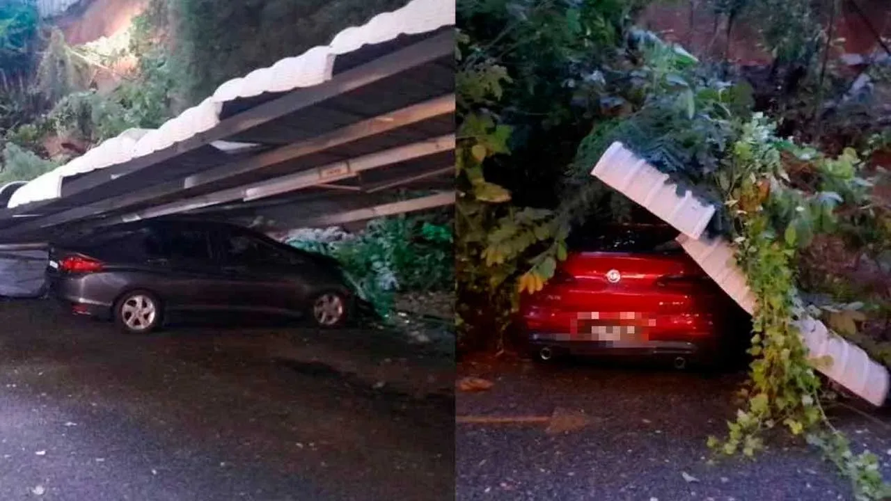 GEORGE TOWN – Dua kenderaan, masing-masing BMW dan Honda City, rosak teruk selepas dihempap tanah runtuh berhampiran 33 Leisure Bay Condominium, Jalan Tanjung Tokong, Tanjung Bungah, di sini pada petang Ahad.