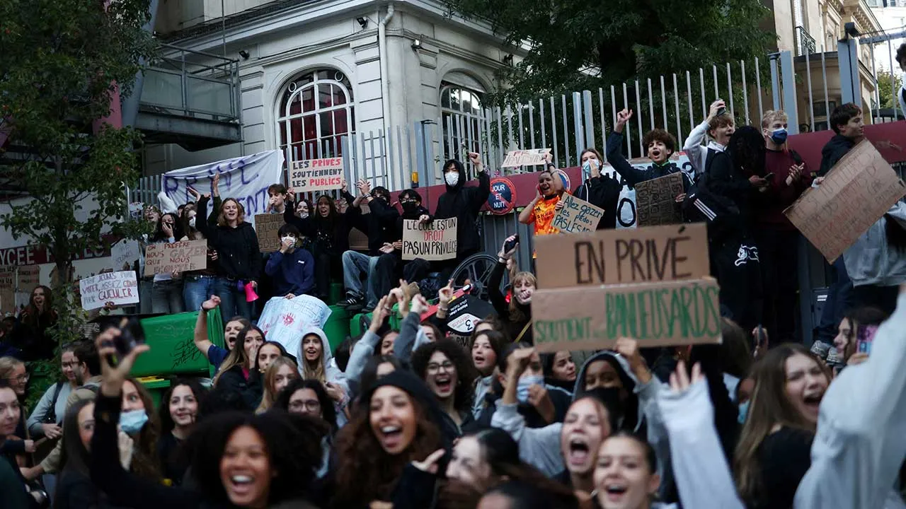 French high school students gather outside the Lycee Charles Peguy high school in Paris as part of a nationwide day of demonstrations and blockades, voicing anger over overcrowded classrooms, teacher shortages and dilapidated school buildings, which students blame on years of underinvestment, France, October 6, 2026. REUTERS/Tom Nicholson TPX IMAGES OF THE DAY