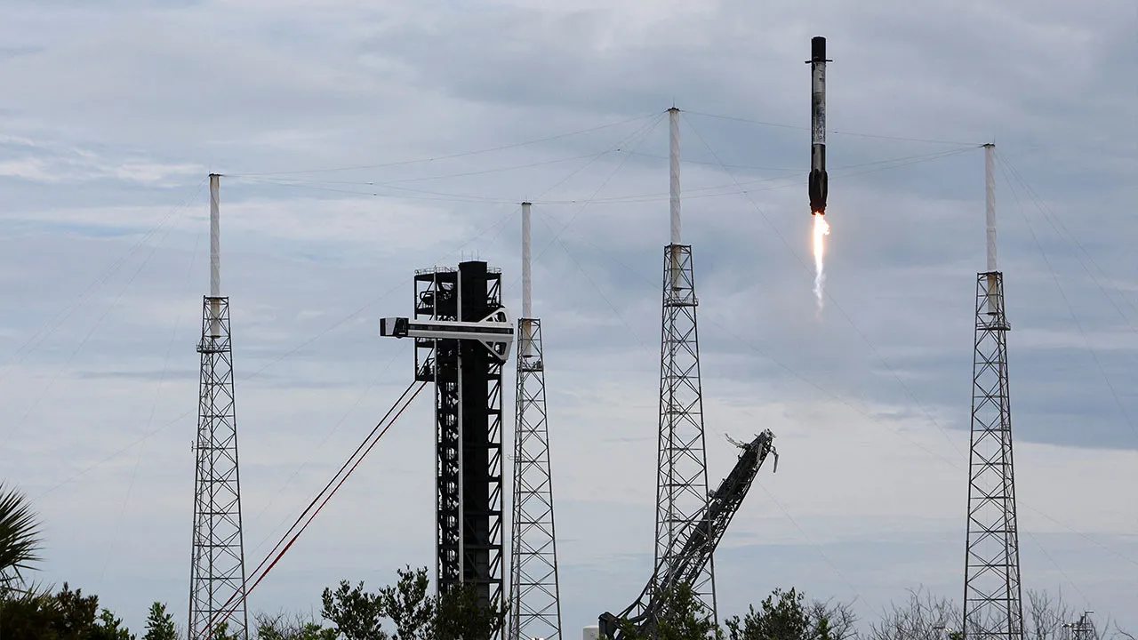 A SpaceX Falcon 9 booster returns to land after it and a Dragon spacecraft lift off on NASA's Crew-13 mission to the International Space Station, carrying NASA astronauts Jessica Watkins, Luke Delaney, Canadian Space Agency astronaut Joshua Kutryk and Russian cosmonaut Sergey Teteryatnikov at the Cape Canaveral Space Force Station in Cape Canaveral, Florida, U.S., October 1, 2026. REUTERS/Philip Scott Andrews