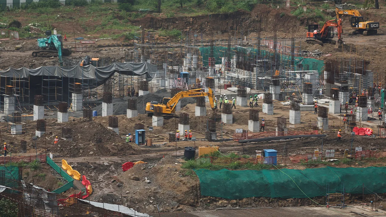 Workers and excavators operate at the site of an Amazon data centre in Thane, India, September 22, 2026. - REUTERS/Francis Mascarenhas