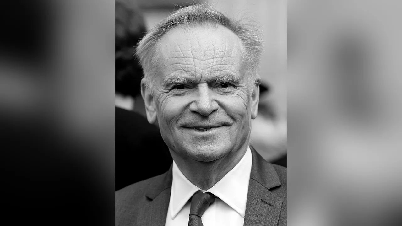 FILE PHOTO: Author Jeffrey Archer leaves a memorial service for actor and director Richard Attenborough at Westminster Abbey in London March 17, 2015. REUTERS/Suzanne Plunkett/File Photo