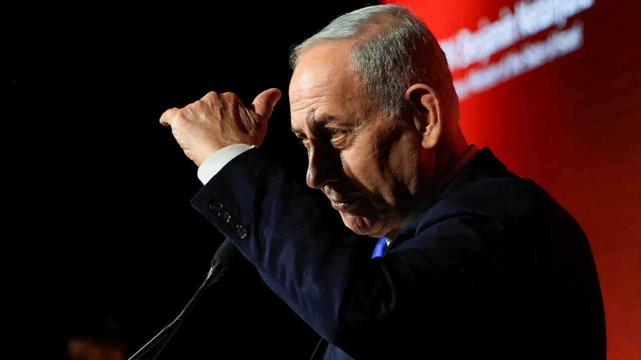 FILE PHOTO: Israeli Prime Minister Benjamin Netanyahu speaks at the JNS (Jerusalem News Syndicate) International Policy Summit in Jerusalem, June 21, 2026. REUTERS/Ronen Zvulun/File Photo