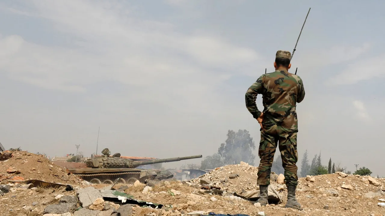Soldiers loyal to Syria's President Bashar al-Assad forces are deployed at al-Qadam area near Yarmouk Palestinian camp in Damascus,Syria April 29,2018.REUTERS/ Omar Sanadiki