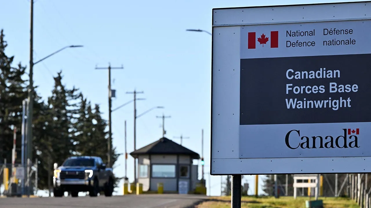 A sign for Canadian Forces Base (CFB) Wainwright, the day after a serious incident that resulted in a fire caused deaths and injuries, in Wainwright, Alberta, Canada, October 18, 2026. REUTERS/Jennifer Gauthier