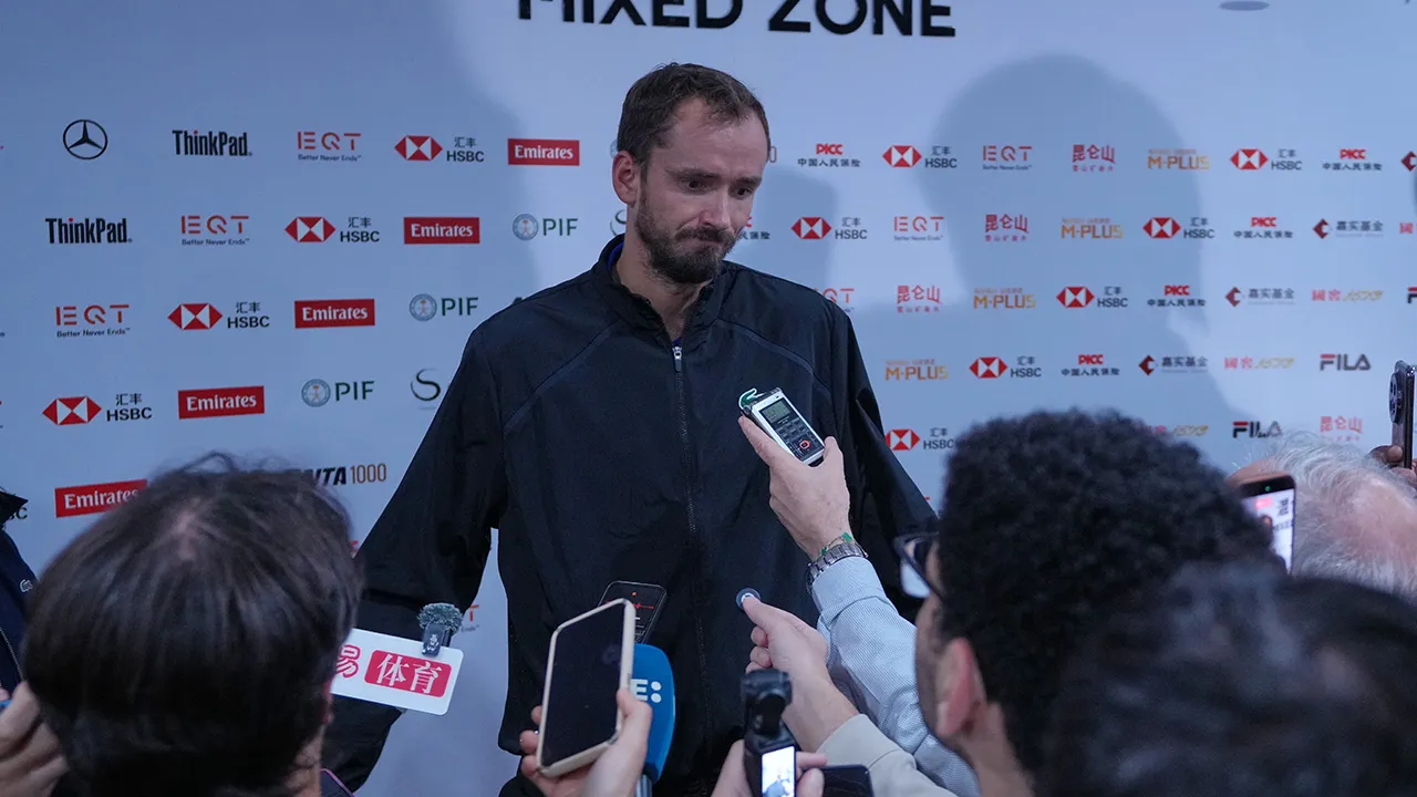 Daniil Medvedev, of Russia, speaks to the media after being disqualified from the men's single semi-final match against Novak Djokovic, of Serbia at the China Open tennis tournament in Beijing, Monday, Oct. 5, 2026. (AP Photo/Andy Wong)