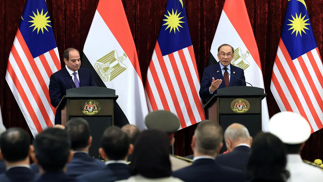 PUTRAJAYA, Oct 10 - Prime Minister Datuk Seri Anwar Ibrahim (right) speaks at a joint press conference with Egyptian President Abdel Fattah El-Sisi at Seri Perdana Complex today.  - fotoBERNAMA (2026) COPYRIGHT RESERVED