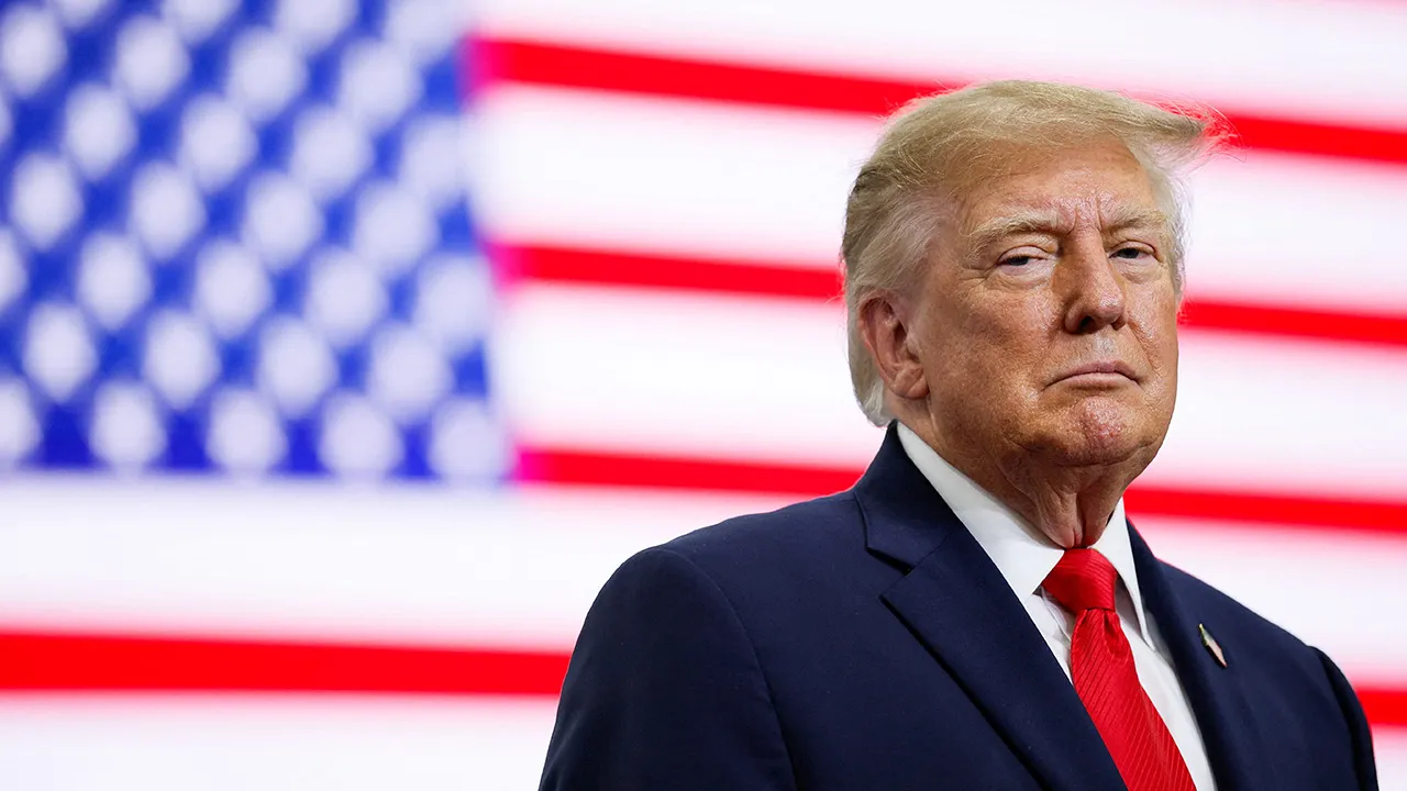 US President Donald Trump on stage at the Curtis D. Menard Memorial Sports Center in Wasilla, Alaska, US, October 13, 2026. REUTERS/