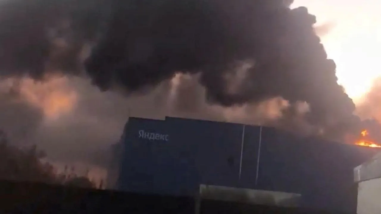 FILE PHOTO: Smoke billows from Yandex's Sasovo hub, one of the company's five large data centres, after a fire following a drone strike forced the suspension of operations at the site, which hosts tens of thousands of servers, Sasovo, Russia, in this screengrab obtained from a social media video on Otober 8, 2026. SOCIAL MEDIA/via REUTERS.