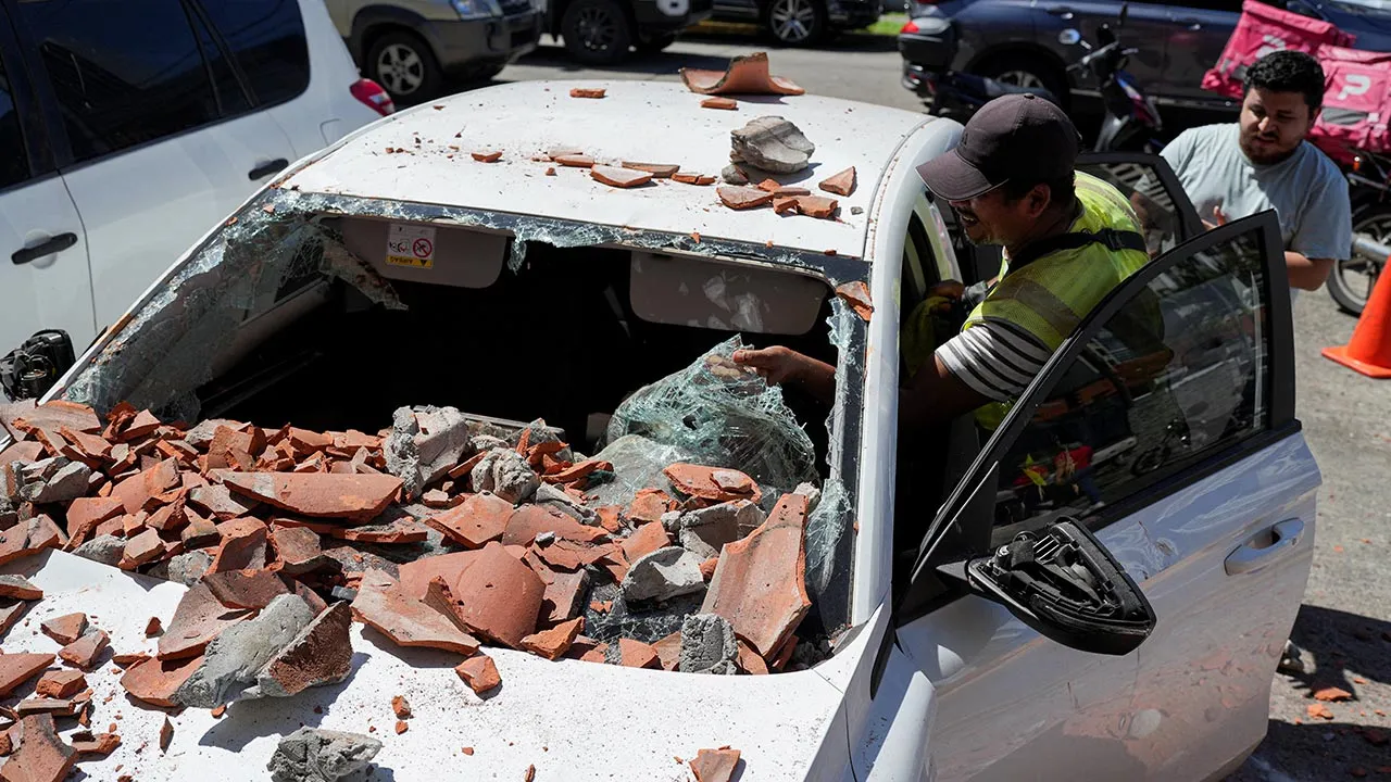 A car damaged by falling debris after an earthquake struck near the southern coast of Panama, in Panama City, Panama, October 9, 2026. REUTERS/Enea Lebrun