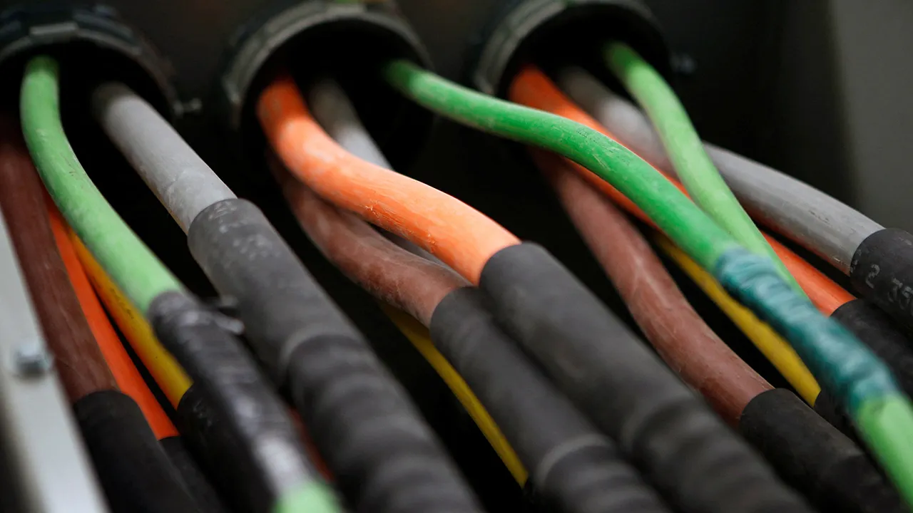 Fiber optic cables carrying internet providers are seen running into a server room at Intergate.Manhattan, a data center owned and developed by Sabey Data Center Properties, during a tour of the facility in lower Manhattan, in New York, March 20, 2013.The 32-story building will be the largest high-rise data center in the world with 600,000 square feet (55,742 square meters) of data center floor space and 40 Megawatts of electrical capacity. REUTERS/Mike Segar