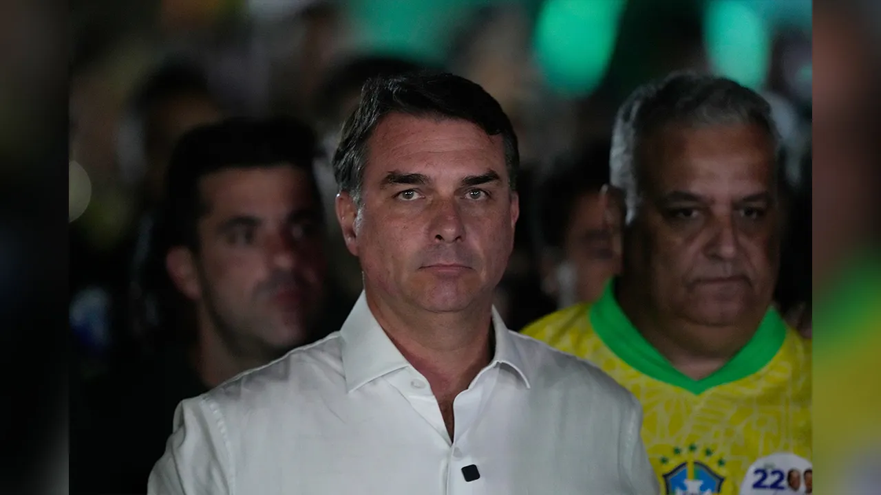 Opposition presidential candidate Sen. Flavio Bolsonaro arrives at his election night event after the presidential runoff in Brasilia, Brazil, Sunday, Oct. 25, 2026.(AP Photo/Eraldo Peres)