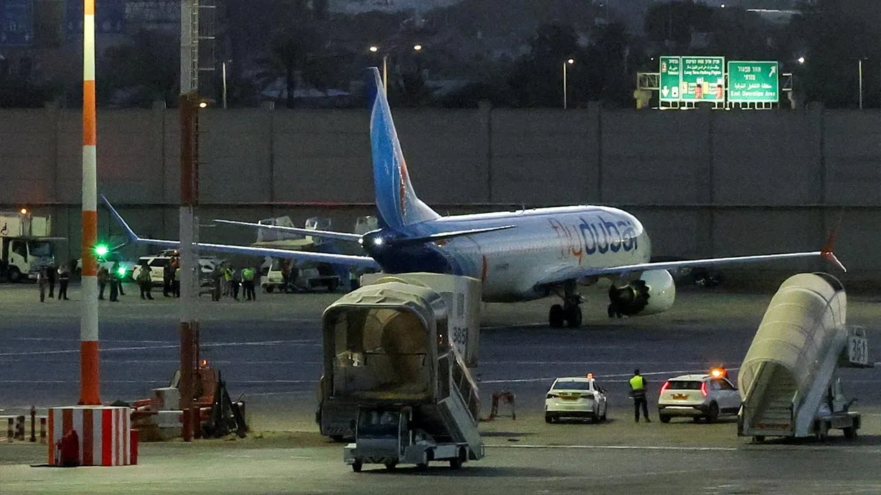 A plane, carrying passengers who were on the FlyDubai aircraft bound for Israel from the United Arab Emirates, which was diverted to Saudi Arabia following an emergency signal, on the tarmac as it arrives at the Ben Gurion International Airport, in Lod, near Tel Aviv, Israel, September 30, 2026. REUTERS/Ammar Awad TPX IMAGES OF THE DAY