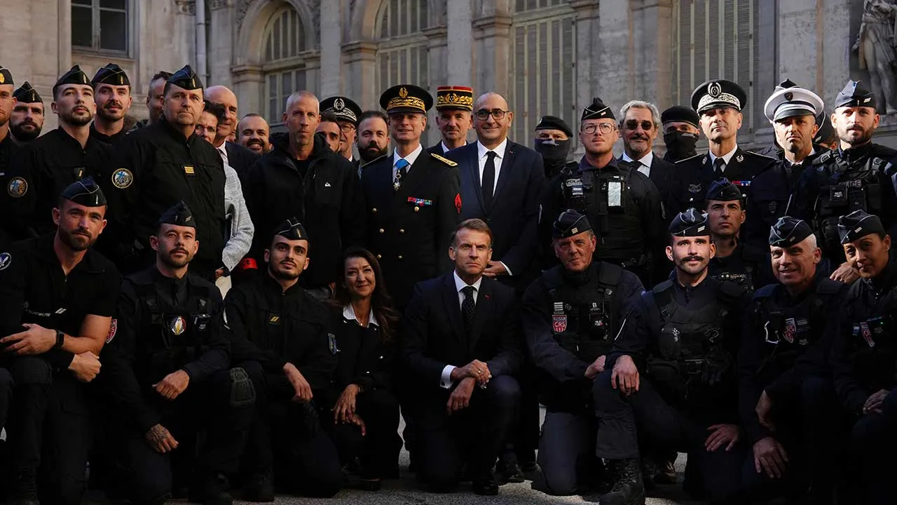French President Emmanuel Macron meets with police officers in Marseille, France, Monday, Oct. 26, 2026. (AP Photo/Aurelien Morissard, Pool)