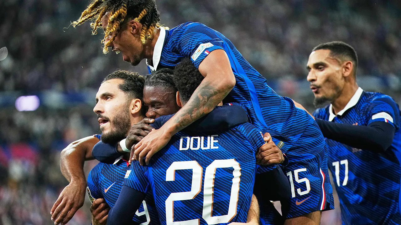 France players celebrate after scoring during the Nations League soccer match between France and Belgium in Saint-Denis near Paris, Monday, Oct. 5, 2026. (AP Photo/Teresa Suarez)