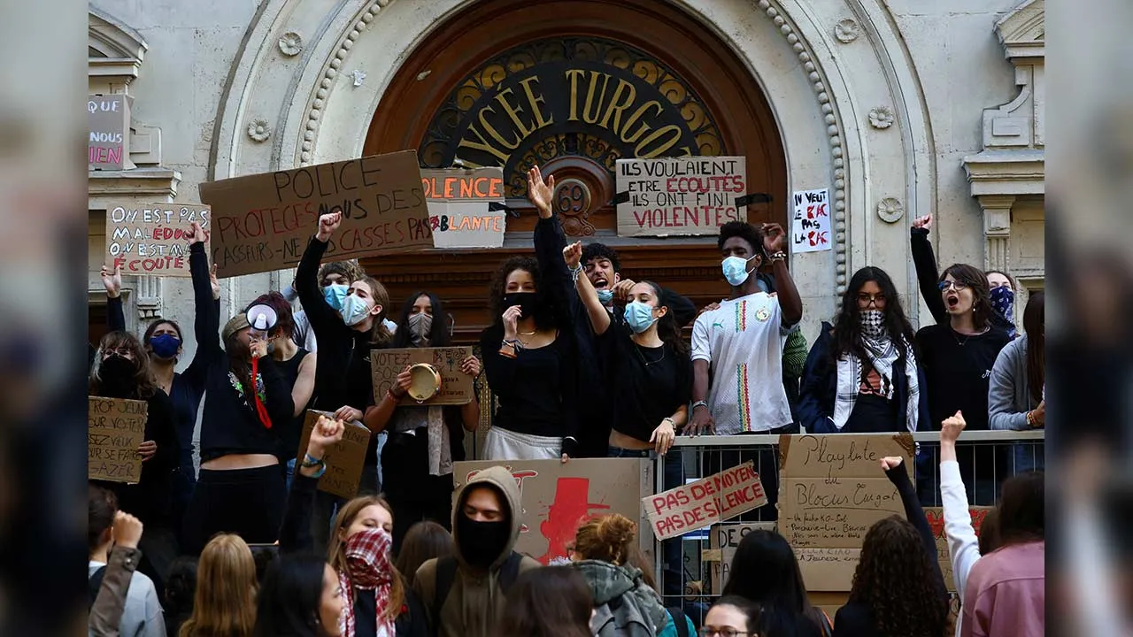 French high school students gather outside the Lycee Turgot high school in Paris as part of nationwide protests voicing anger over overcrowded classrooms, teacher shortages and dilapidated school buildings, which students blame on years of underinvestment, France, October 5, 2026. REUTERS/Yves Herman
