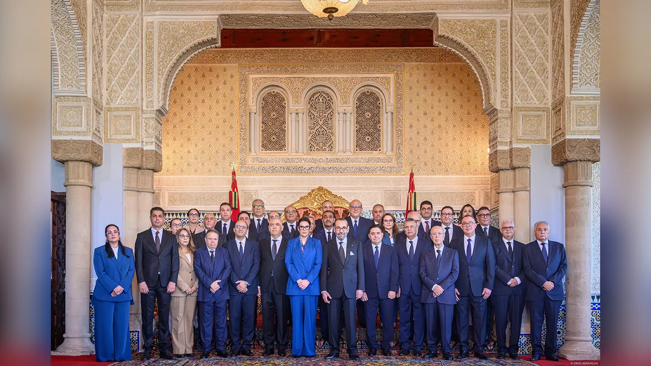 King Mohammed VI of Morocco poses for an official group photograph with government members at the Royal Palace in Rabat, Morocco, October 16, 2026. Moroccan Royal Palace/Handout via REUTERS THIS IMAGE HAS BEEN SUPPLIED BY A THIRD PARTY. WATERMARK FROM SOURCE.