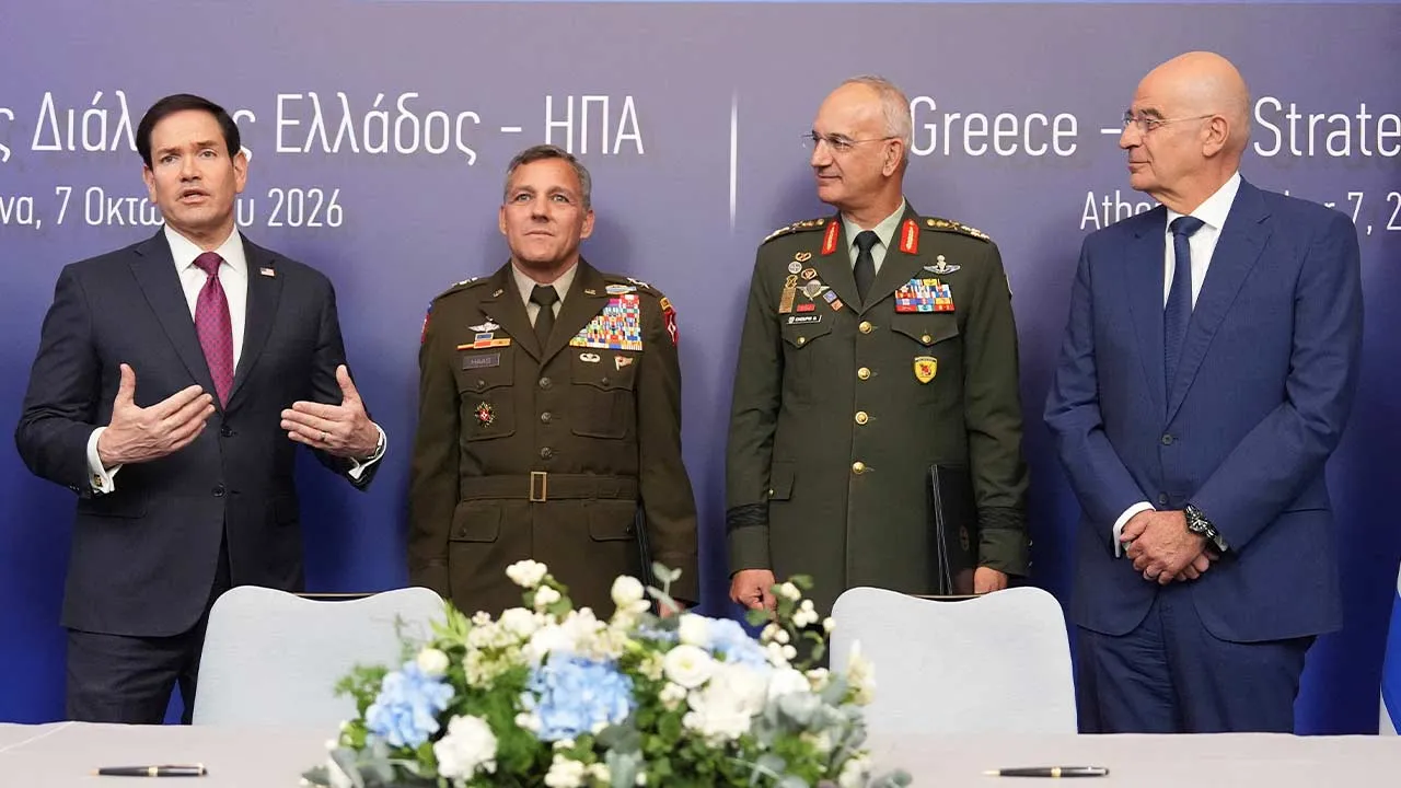U.S. Secretary of State Marco Rubio speaks as Maj. Gen. John Haas, Florida’s adjutant general, Gen. Dimitrios Choupis, chief of the Hellenic National Defence General Staff, and Greek Defense Minister Nikos Dendias listen during a signing ceremony at the Conrad Hotel in Athens, Greece October 7, 2026. Mark Schiefelbein/Pool via REUTERS