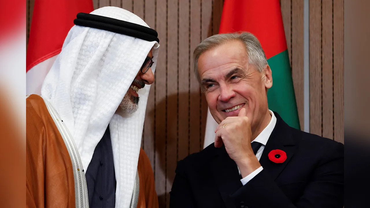 Canada’s Prime Minister Mark Carney and Abu Dhabi’s Crown Prince Khaled Bin Mohamed Bin Zayed Al-Nahyan chat during a signing ceremony on Parliament Hill in Ottawa, Ontario, Canada, October 27, 2026. REUTERS/Patrick Doyle