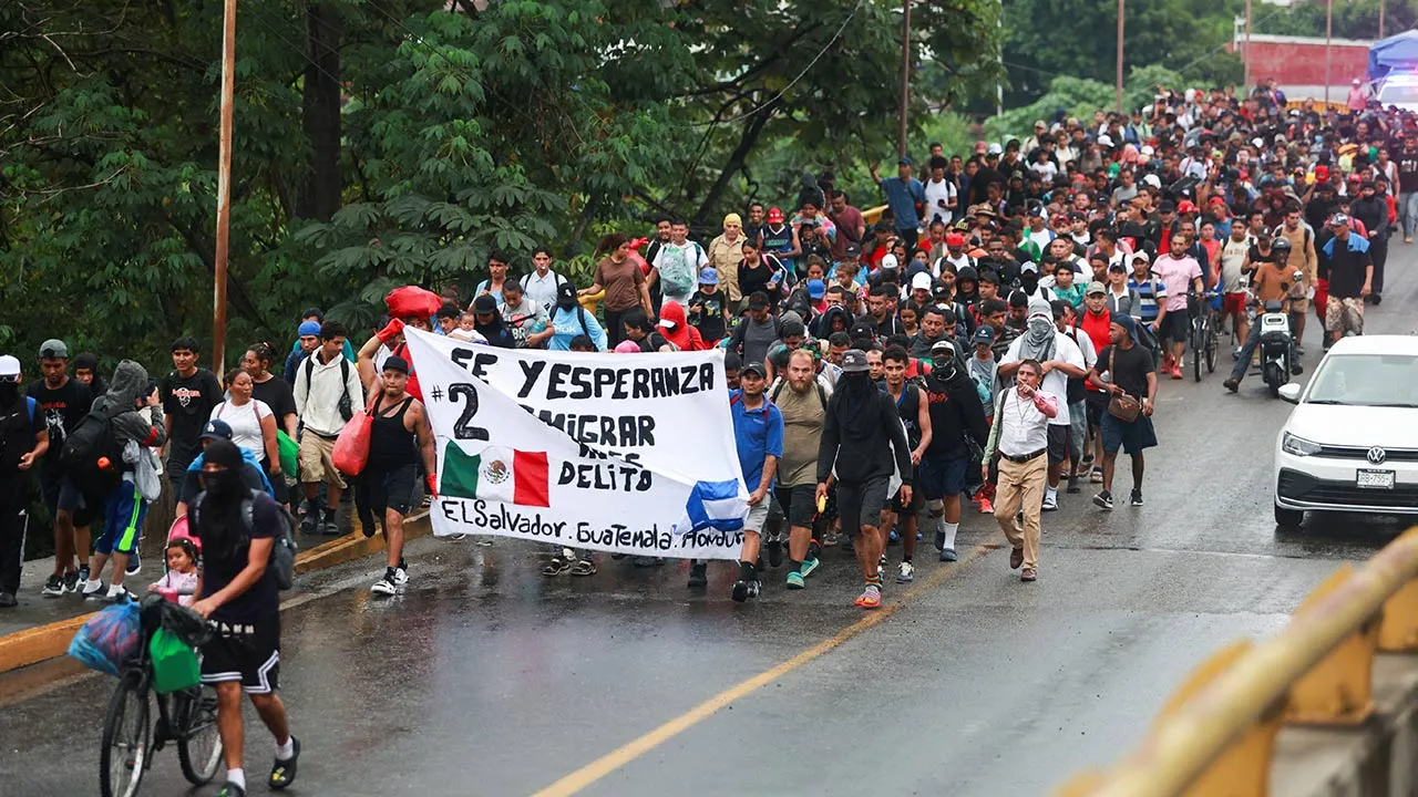 Migrants of various nationalities participate in a caravan known as "Faith and Hope" (Fe y Esperanza) as they seek migration documents that would allow them to continue their journey toward central and northern Mexico, in Tapachula, Chiapas, Mexico, October 20, 2026. REUTERS/Damian Sanchez