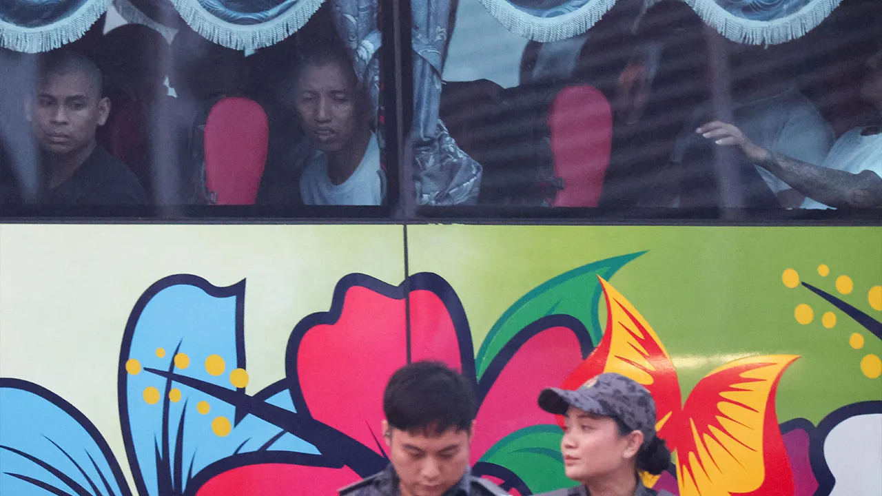 Myanmar nationals due to be repatriated from Malaysia sit inside a bus at Lumut, Malaysia, September 29, 2026. REUTERS/Hasnoor Hussain TPX IMAGES OF THE DAY