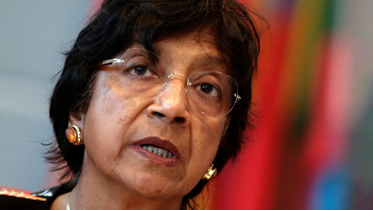 U.N. High Commissioner for Human Rights Navi Pillay addresses the OSCE permament council in Vienna, Austria July 3, 2014. REUTERS/Heinz-Peter Bader
