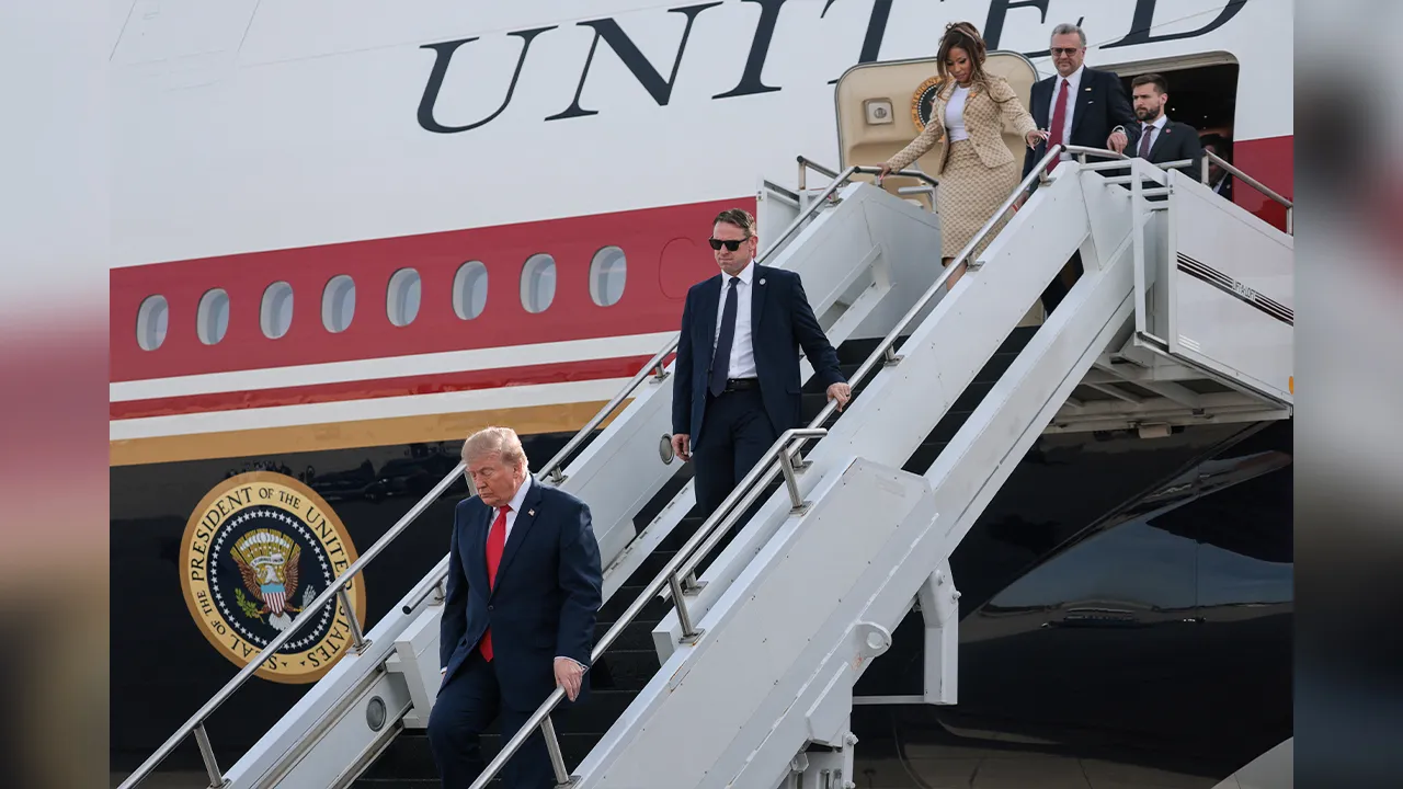 US President Donald Trump and Nicki Minaj disembark Air Force One at Selfridge Air National Guard Base, Michigan, US, October 25, 2026. REUTERS/Jonathan Ernst