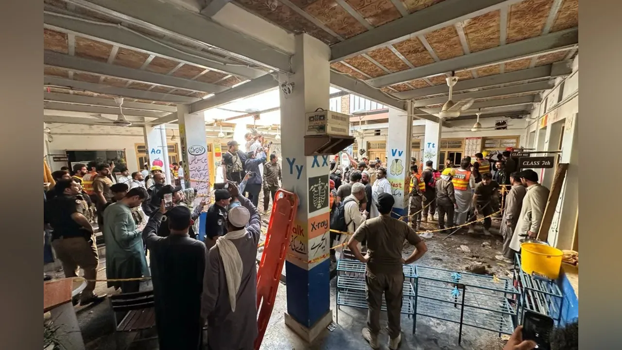 A rescue worker said an upper-floor roof collapsed, crashing through three classrooms/ Reuters