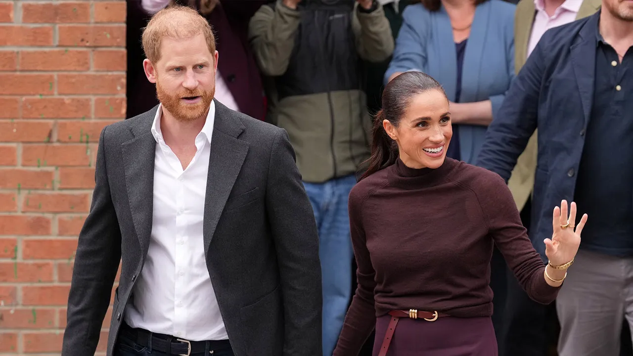Britain's Prince Harry and Meghan, Duke and Duchess of Sussex depart after a visit to Himmah Food Bank in Nottingham, England, Thursday, Oct. 15, 2026. (AP Photo/Maja Smiejkowska)