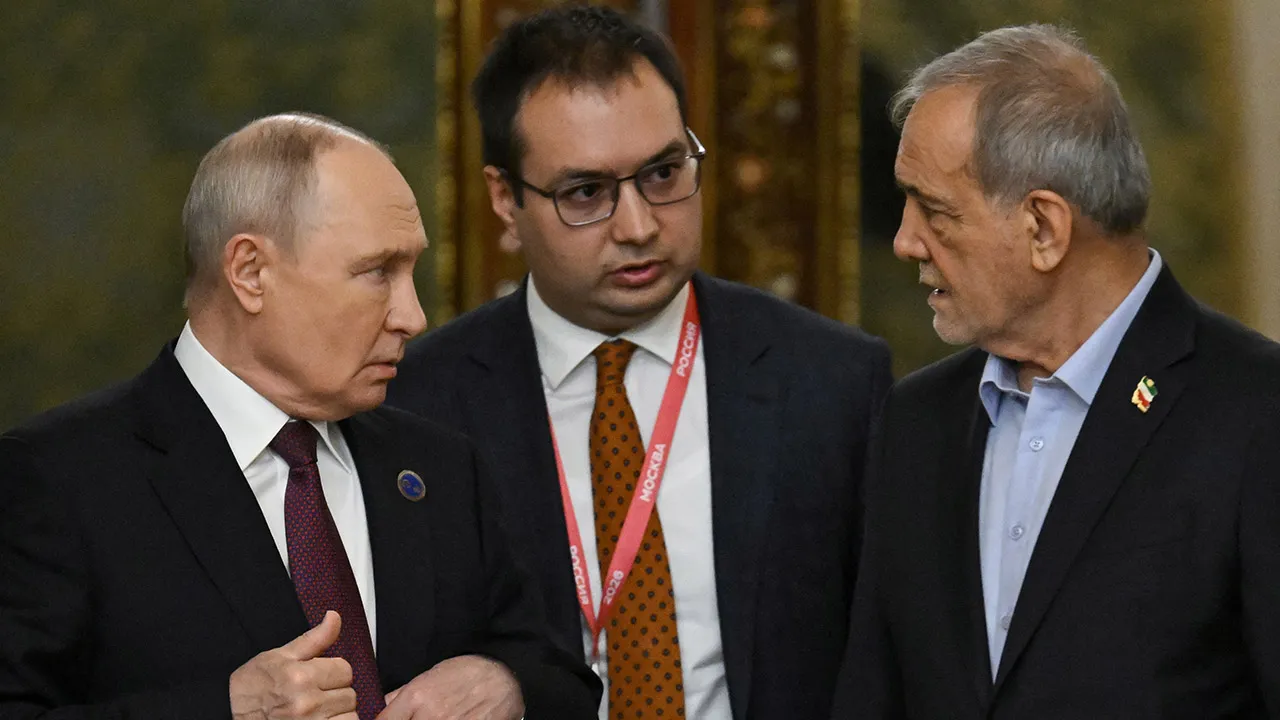 Russian President Vladimir Putin and Iranian President Masoud Pezeshkian attend a meeting at the Grand Kremlin Palace in Moscow, Russia, October 27, 2026. Igor Ivanko/Pool via REUTERS