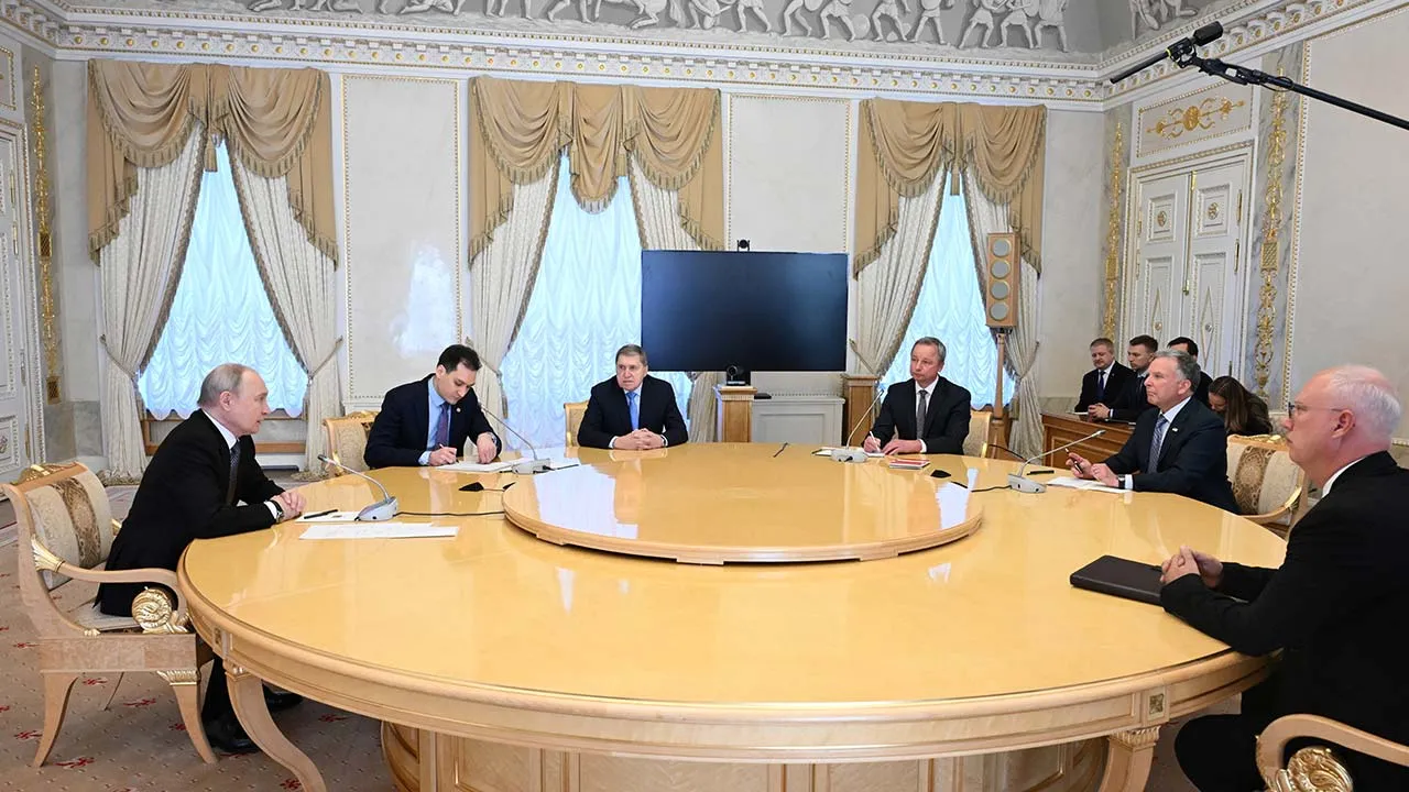 Members of the Russian delegation, including President Vladimir Putin, presidential envoy Kirill Dmitriev and foreign policy adviser Yuri Ushakov, attend a meeting with US special envoy Steve Witkoff at the Constantine Palace in Saint Petersburg, Russia, October 21, 2026. Sputnik/Kristina Solovyova/Pool via REUTERS ATTENTION EDITORS - THIS IMAGE WAS PROVIDED BY A THIRD PARTY.