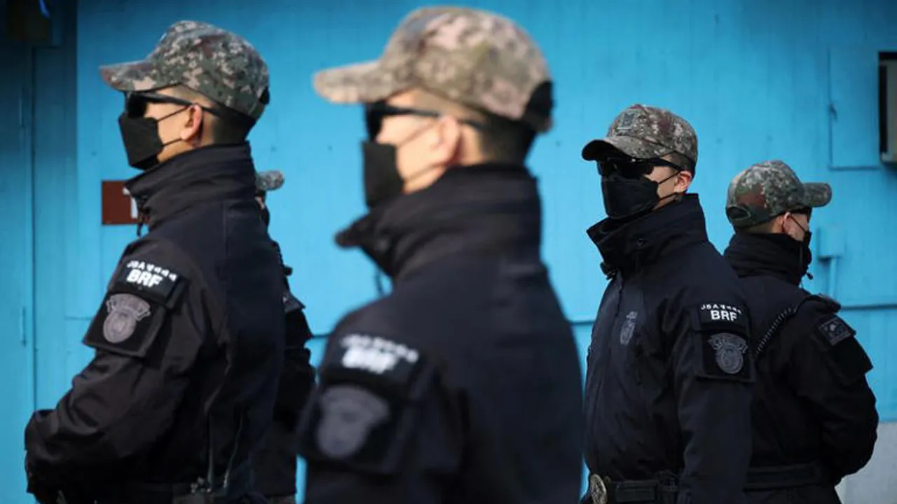South Korean soldiers stand guard in the truce village of Panmunjom inside the demilitarized zone (DMZ) separating the two Koreas, South Korea, February 7, 2023. REUTERS