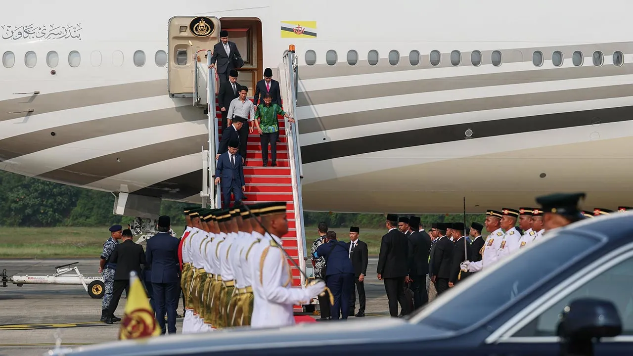 SUBANG, Oct 3 - Sultan of Brunei, Sultan Hassanal Bolkiah, and Prince Abdul Mateen Bolkiah arrive at the Royal Malaysian Air Force (RMAF) Subang Air Base today ahead of the Formula One (F1) Gulf Air Bahrain Grand Prix at the Sepang International Circuit. - fotoBERNAMA (2026) COPYRIGHT RESERVED