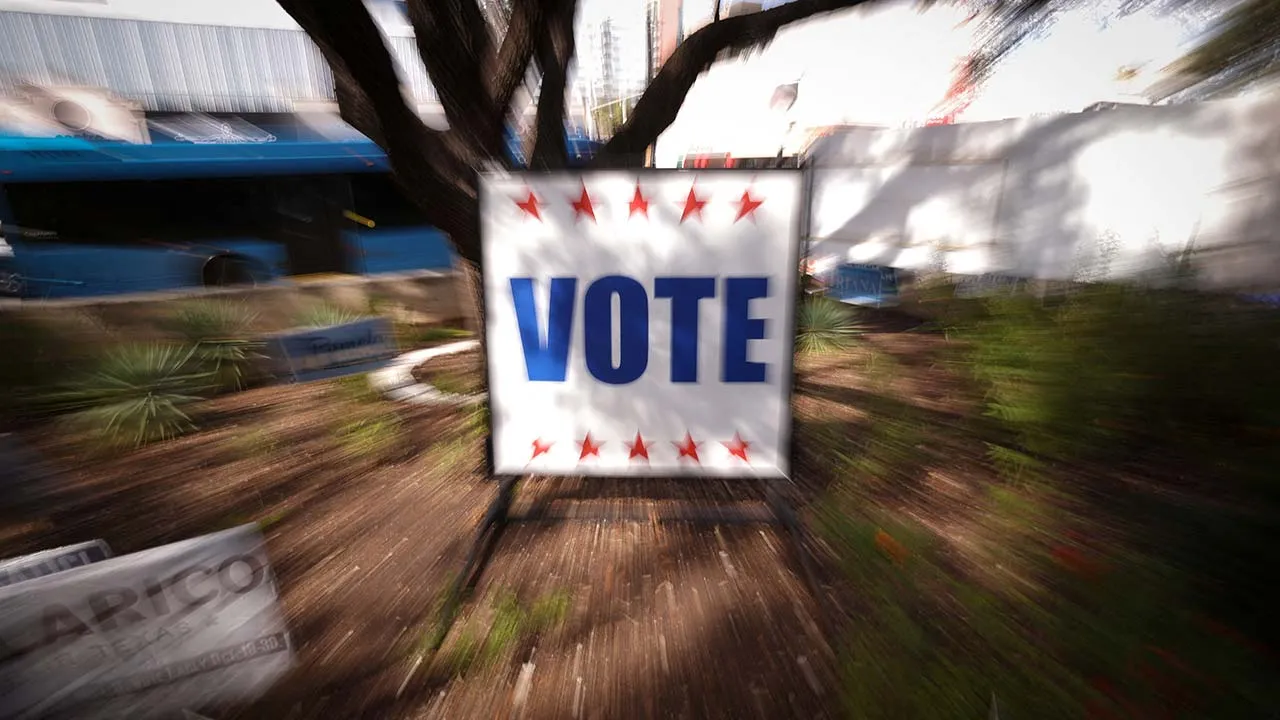 A sign announcing an early voting location on the campus of The University of Texas at Austin during early voting ahead of the November 3rd US midterm elections in Austin, Texas, US, October 27, 2026. Picture taken with a long exposure. REUTERS/Mike Segar