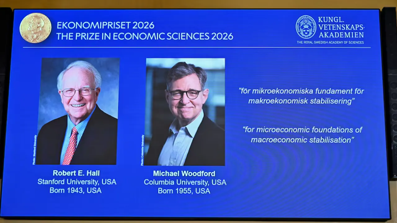 Images of Robert E. Hall and Michael Woodford are displayed as they are announced as the laureates of the 2026 Sveriges Riksbank Prize in Economic Sciences in Memory of Alfred Nobel at the Royal Swedish Academy of Sciences in Stockholm, Sweden, on October 12, 2026. TT News Agency/Anders Wiklund via REUTERS