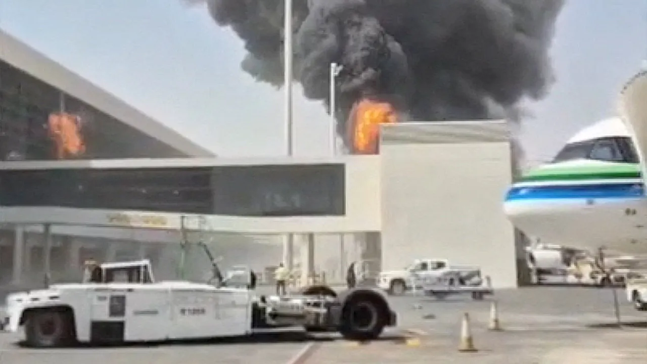Smoke and flames rise from King Khalid Airport, after Yemen's Iran-backed Houthis said they attacked the airport, in Riyadh, Saudi Arabia, October 8, 2026, in this screengrab obtained from a social media video. Social Media/via REUTERS THIS IMAGE HAS BEEN SUPPLIED BY A THIRD PARTY. NO RESALES. NO ARCHIVES. NEWS USE ONLY. BEST QUALITY AVAILABLE. Verification lines: The location was verified as Riyadh, Saudi Arabia, from the airport buildings, light poles, and painted tarmac markings which matched satellite i
