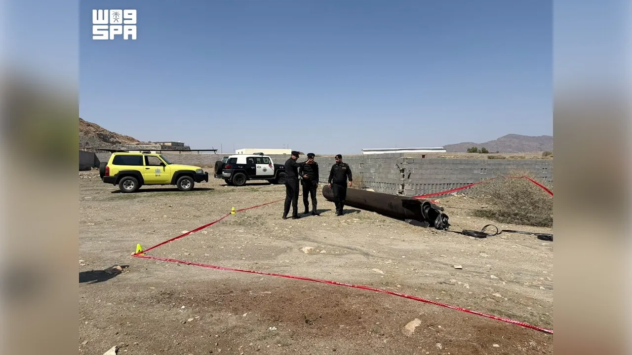 Officials inspect debris from ballistic missile interceptions, in Ar Rashidiyyah, near Mecca, Saudi Arabia, in this image released on October 24, 2026. Saudi Press Agency /Handout via REUTERS THIS IMAGE HAS BEEN SUPPLIED BY A THIRD PARTY. TEXT OVERLAY FROM THE SOURCE. DO NOT OBSCURE LOGO. Verification lines: Reuters verified the location of the photos from the buildings, the mountain and the electricity pylon seen in the photos, which matched satellite and archive imagery of the area. The date when the phot
