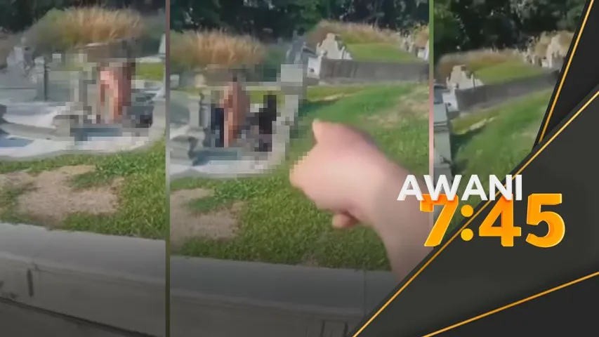 Polis tahan pasangan di kubur