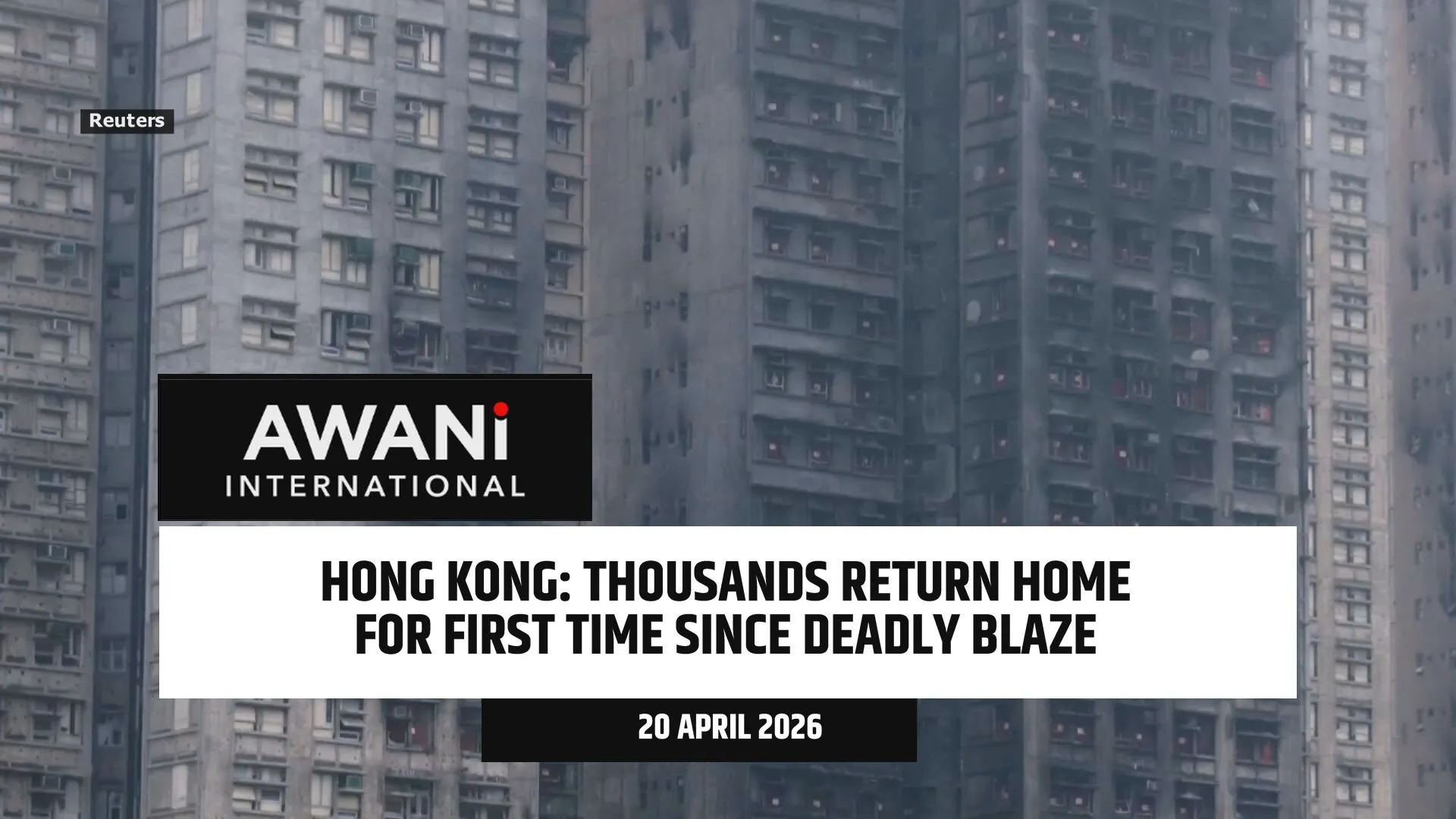 Thousands in HK return home for first time since deadly blaze