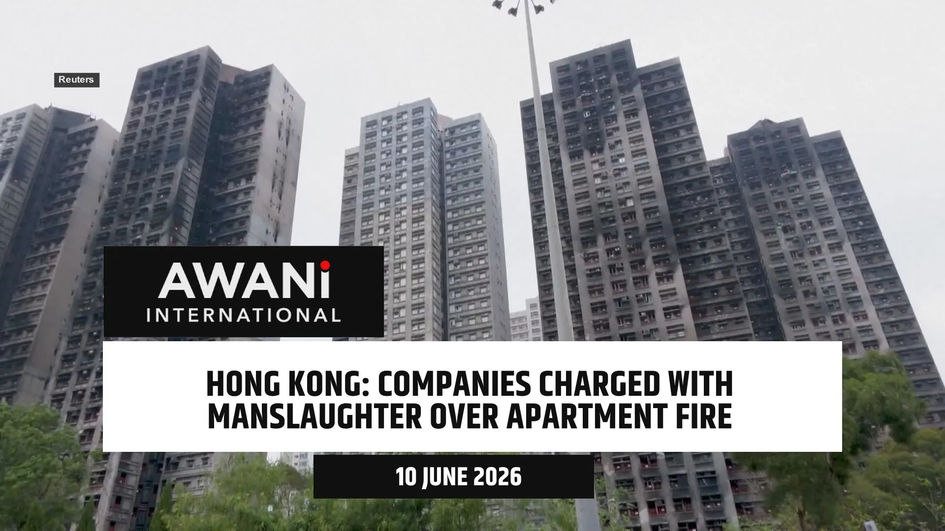 Companies charged with manslaughter over HK apartment fire